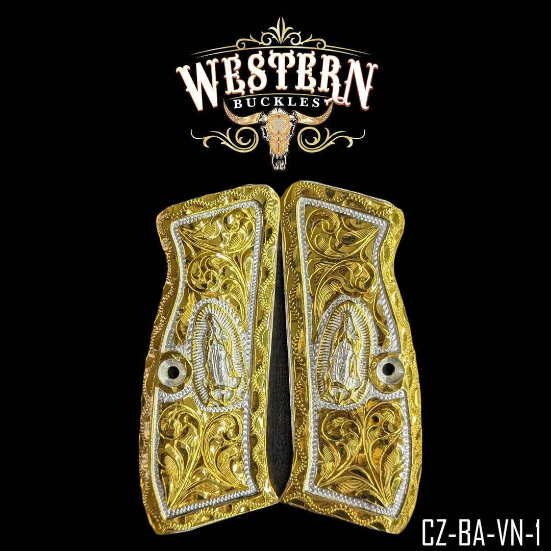 Engraved gold-tone Colt 1911 pistol grips with intricate floral pattern and religious icon
